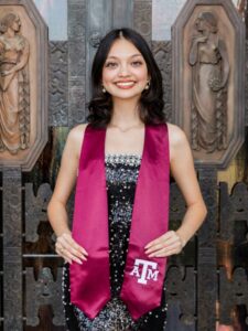 eliana with graduation sash