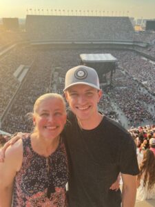 stacy with son in kyle field